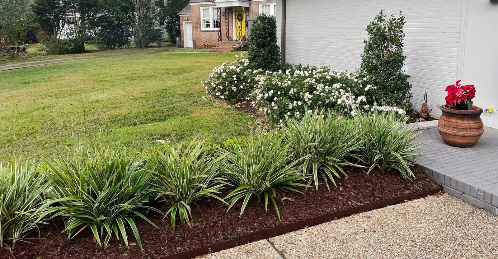 Front lawn and mulched bed at a Baton Rouge home