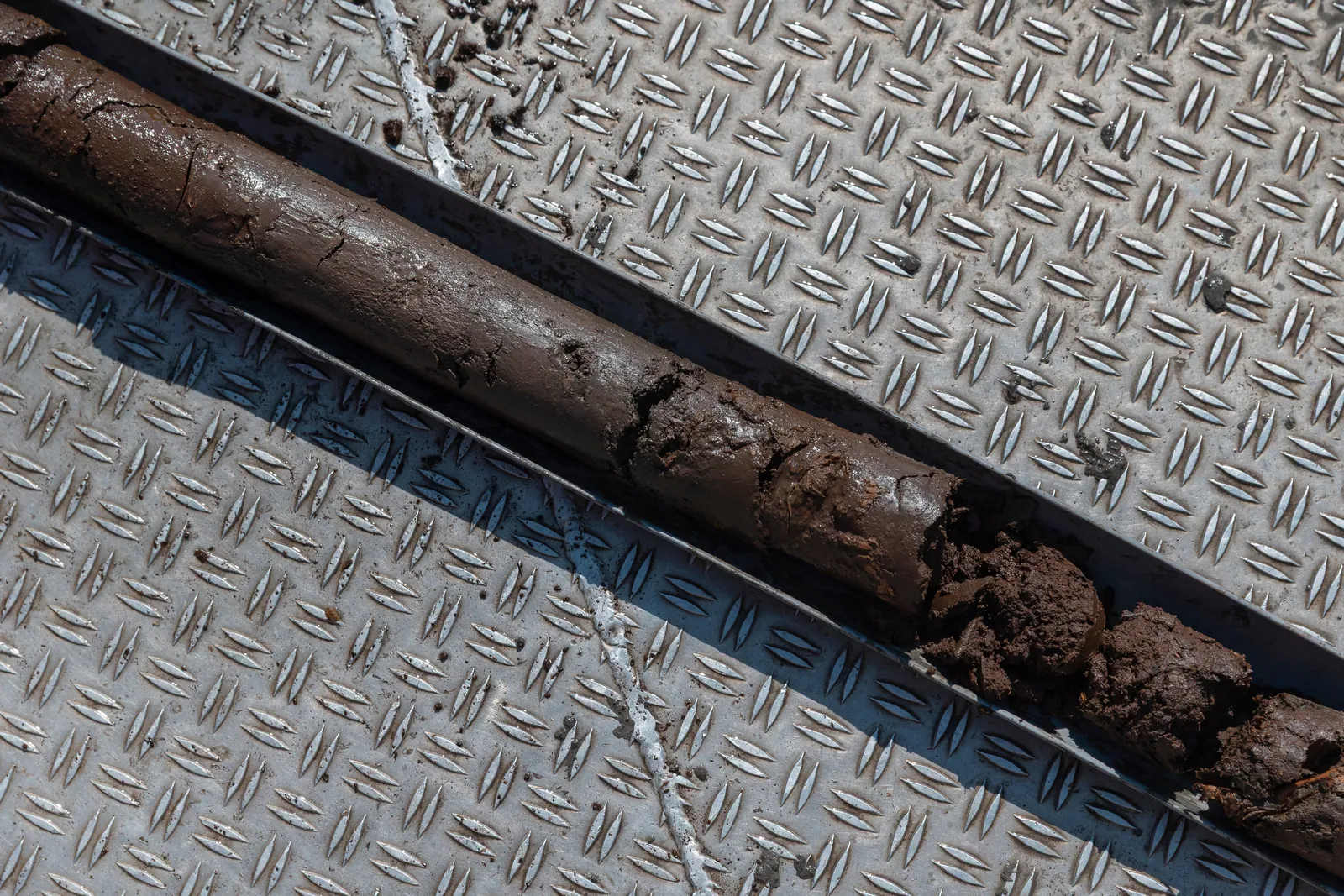Long soil core sample laid out to show the layers underground in Baton Rouge, LA
