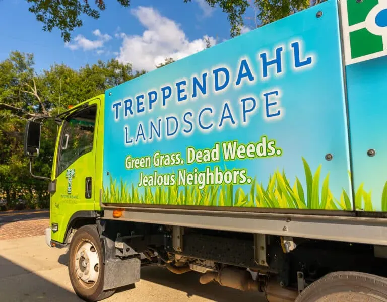 Treppendahl Landscape truck with the Green Grass. Dead Weeds. Jealous Neighbors. wrap in Baton Rouge, LA